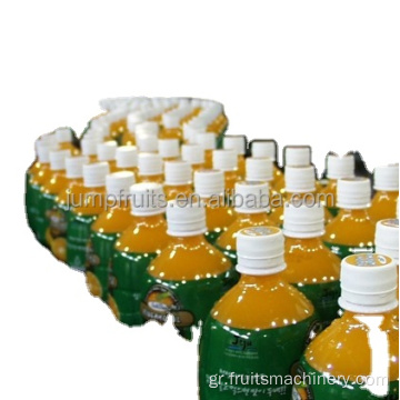Συσκευασία χυμού πορτοκαλιού σε μηχανή σφράγισης πλήρωσης μπουκαλιών